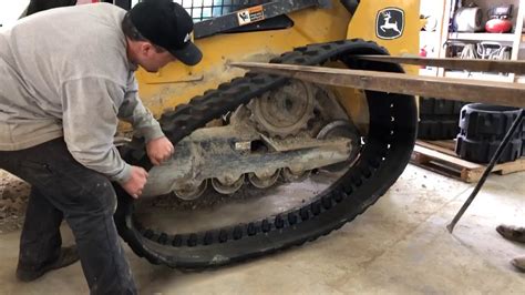 how to put tracks back on a avs skid steer|how to get skid steer track back.